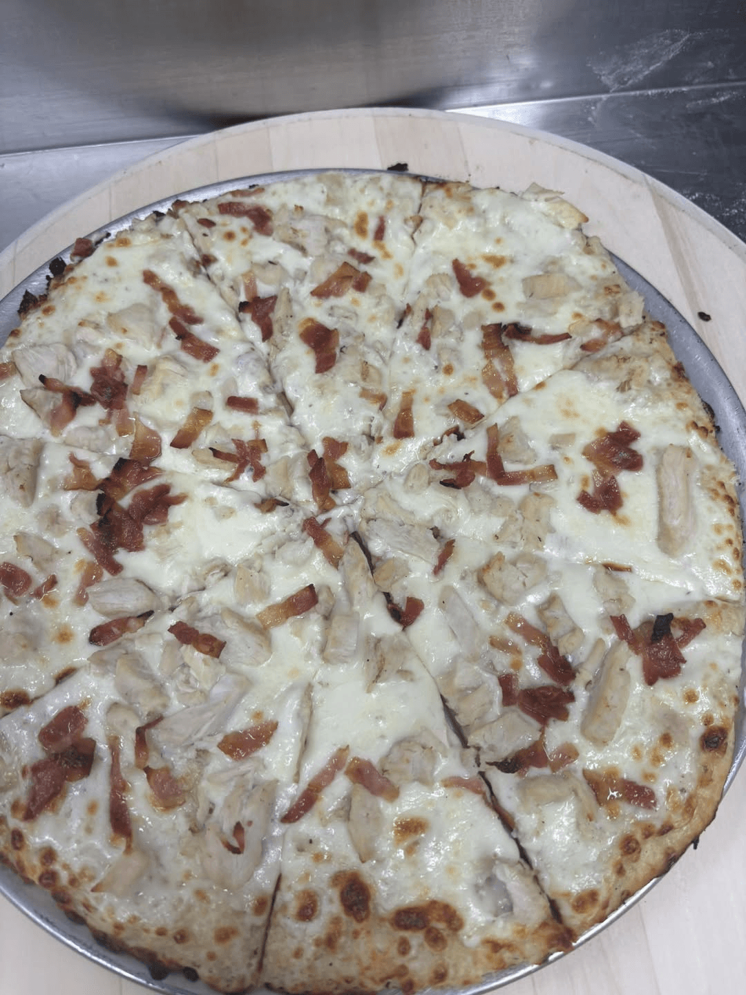 Chicken bacon ranch pizza with white sauce